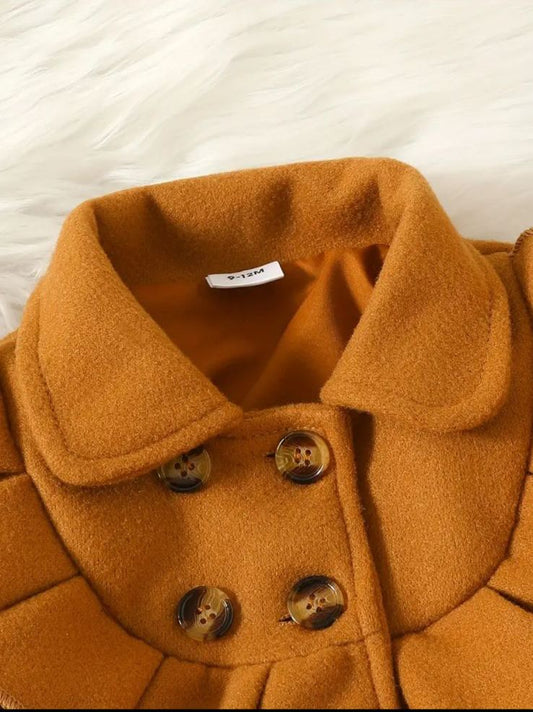 Camel winter coat with wide folded collar and four button front detail